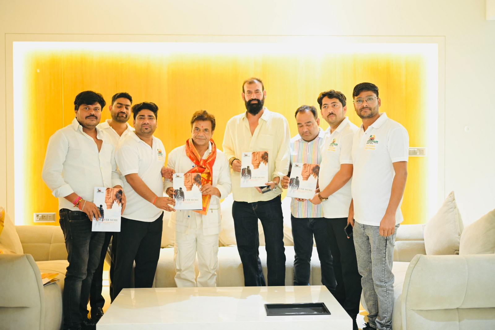 Fragrant Travel team holding commemorative event materials